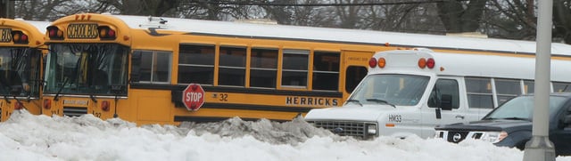 Public school buses snowed in and unable to move