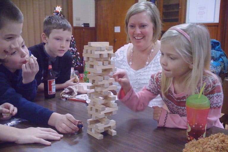 A family playing jenga