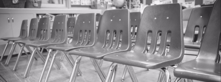 Black and white public school classroom seating