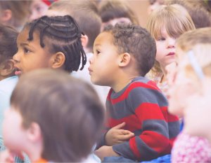 Class of kids anxiously waiting for a break