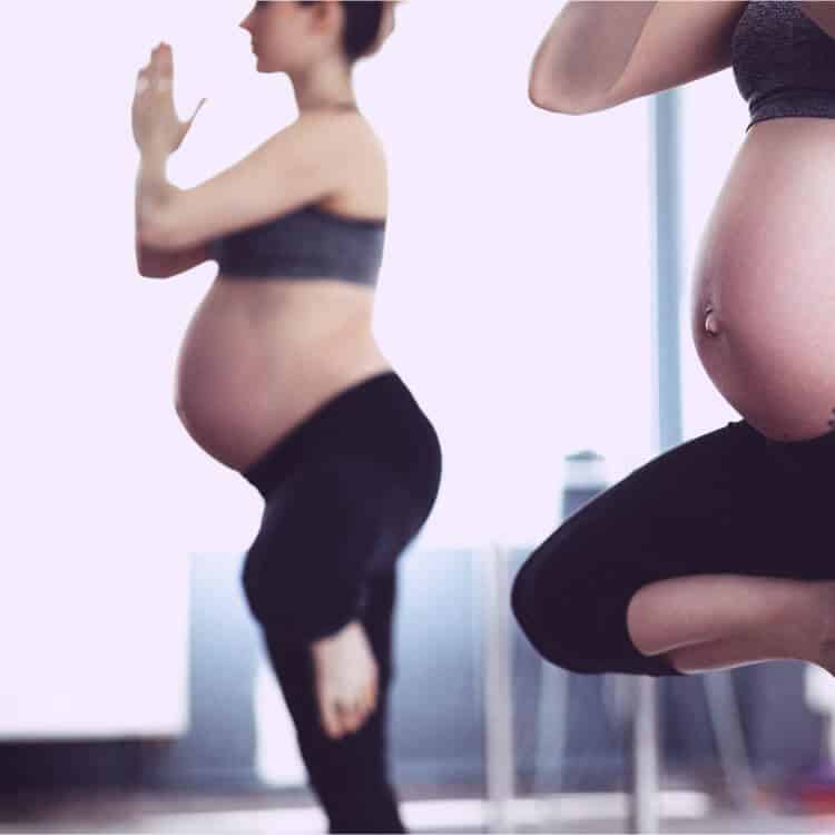 Pregnant woman practicing yoga and mindfulness