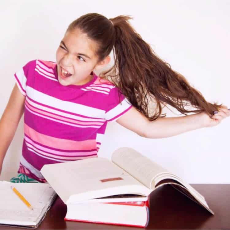 Child so frustrated with traditional school work that she is pulling her hair out