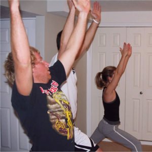 A family doing yoga as a group