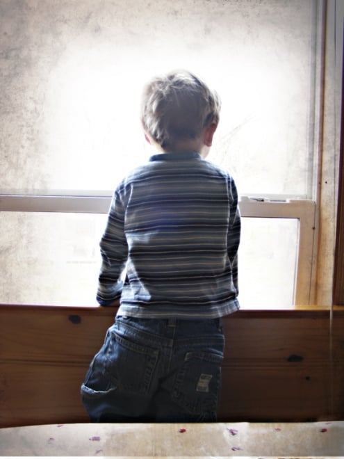 Child looking out the window 