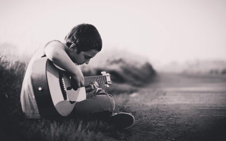 Child Playing Guitar